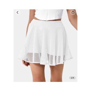 HALARA perforated cloud tennis skirt in med